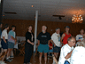 AT THE BANQUET 9